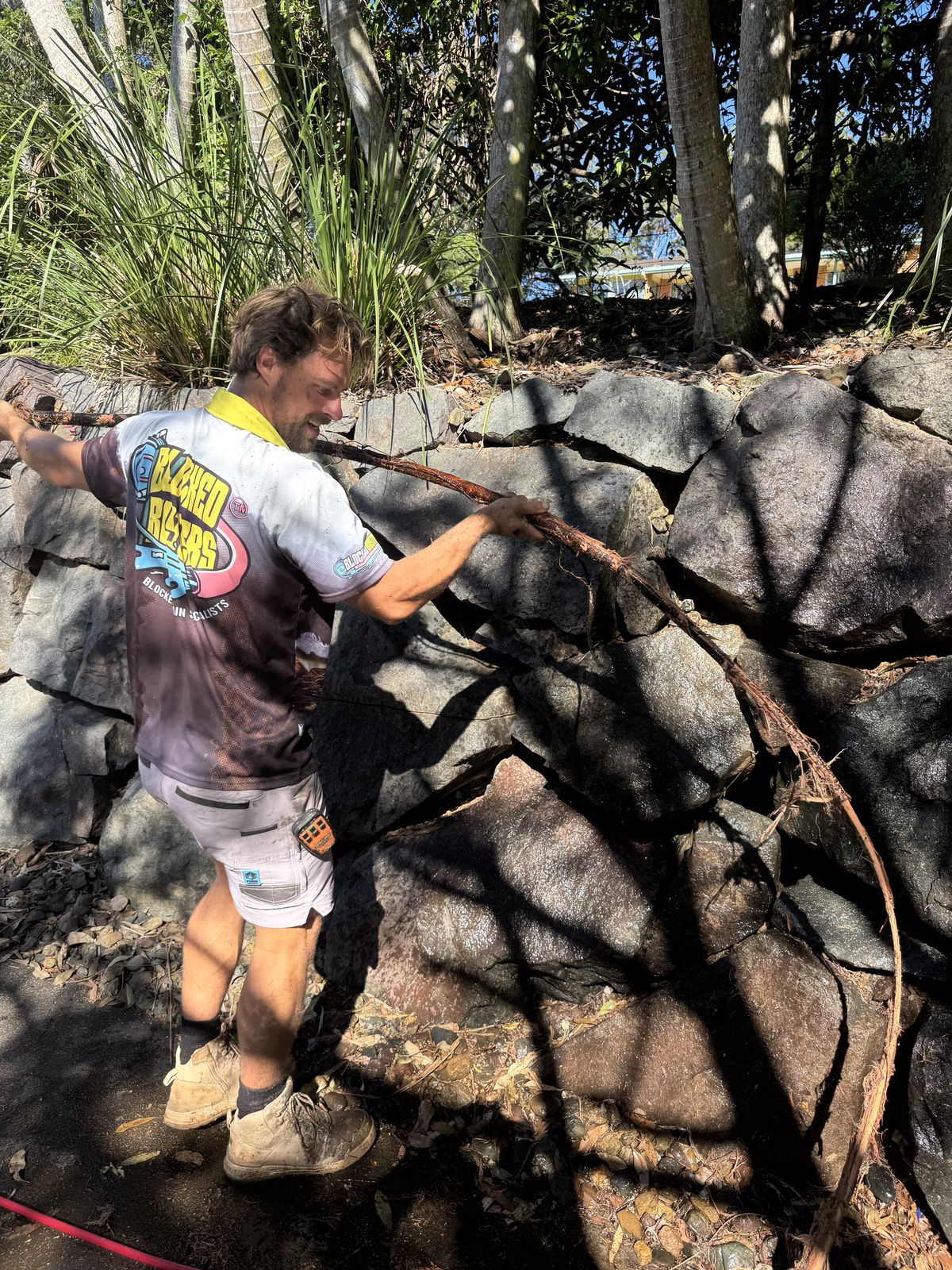 Kevin from Blocked Busters clearing tree roots from a drain